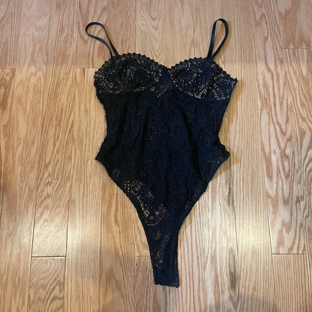 Tiger Mist black lace bodysuit; worn a few times; size medium